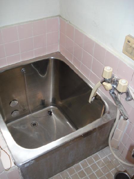 Bath. With a shower in the bathroom