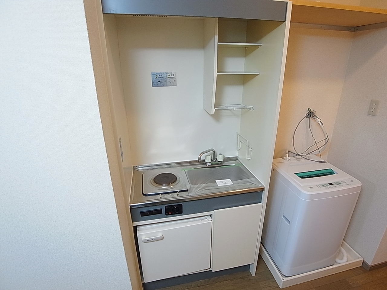 Kitchen. Cute kitchen with a mini-fridge