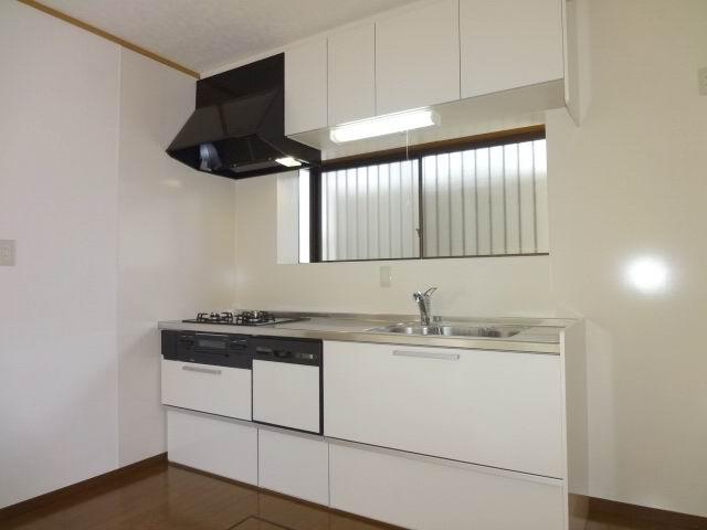 Kitchen. First floor kitchen. This is a system kitchen already replaced with dish washing dryer.