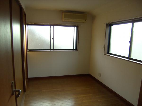 Non-living room. Bright room per corner lot