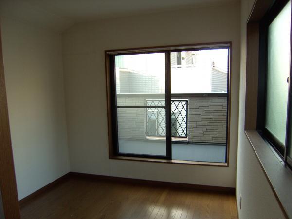 Non-living room. Bright room per corner lot