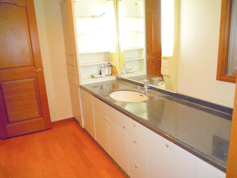 Wash basin, toilet. Washroom three places of some