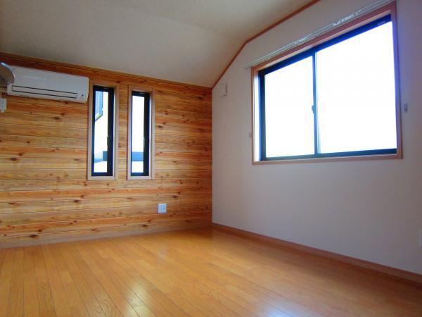 Non-living room. On one side is design wallpaper.  Please to the nursery. 