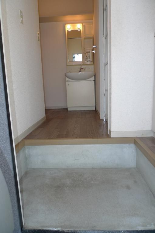 Entrance. A separate room is a reference photograph