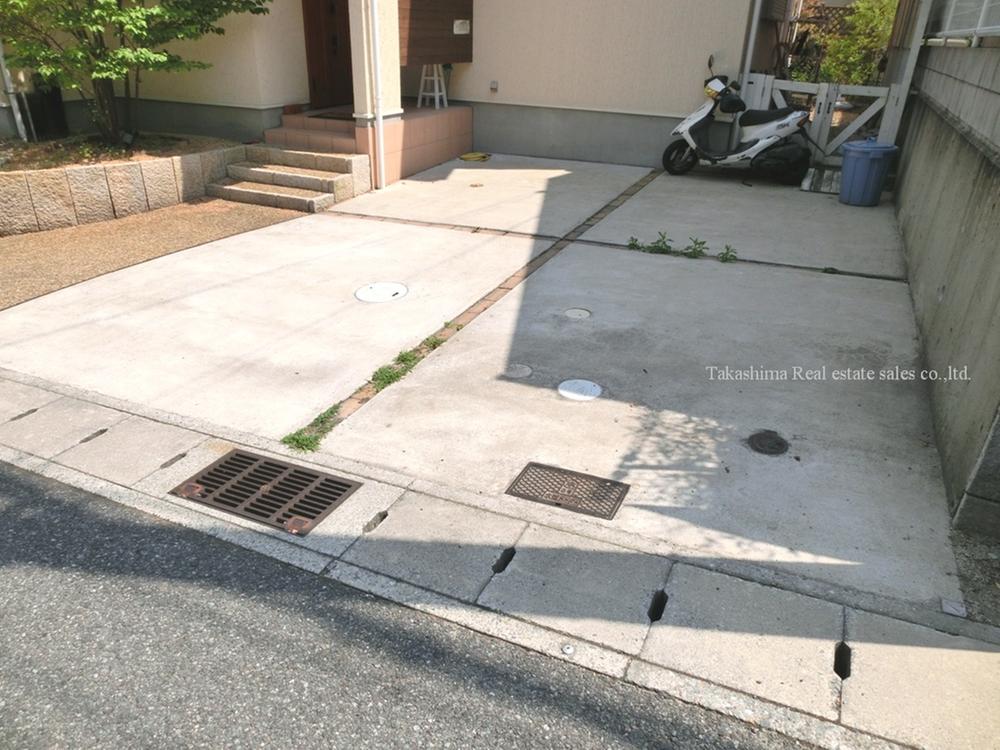 Parking lot. Two is a parking garage can be in parallel. 