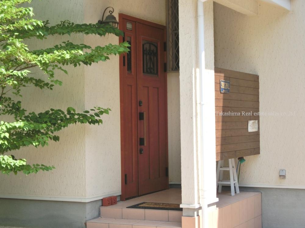 Entrance. It is also safe on a rainy day because there is a large roof there is on the front door. 