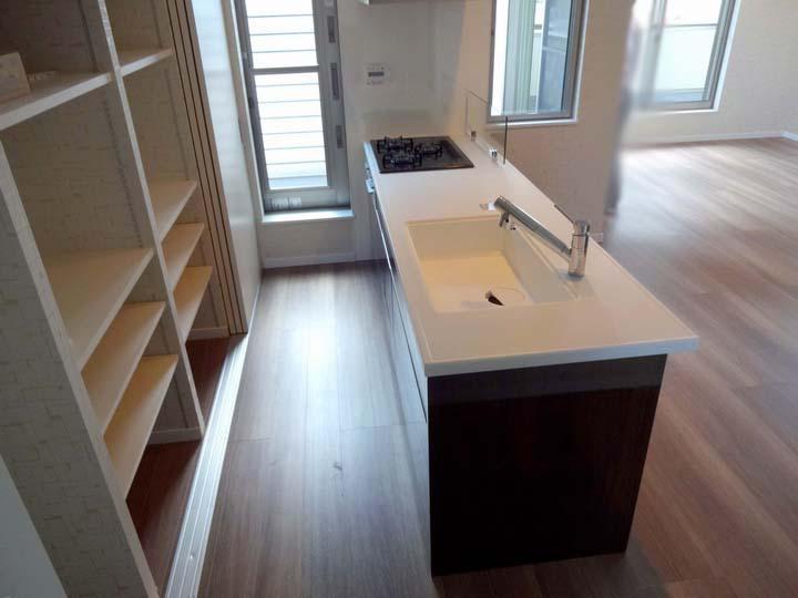 Kitchen. There plenty of storage in the rear space of the kitchen!