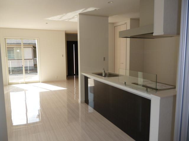 Living. Facing south, Attached to the east side parking spaces, Living is good per yang