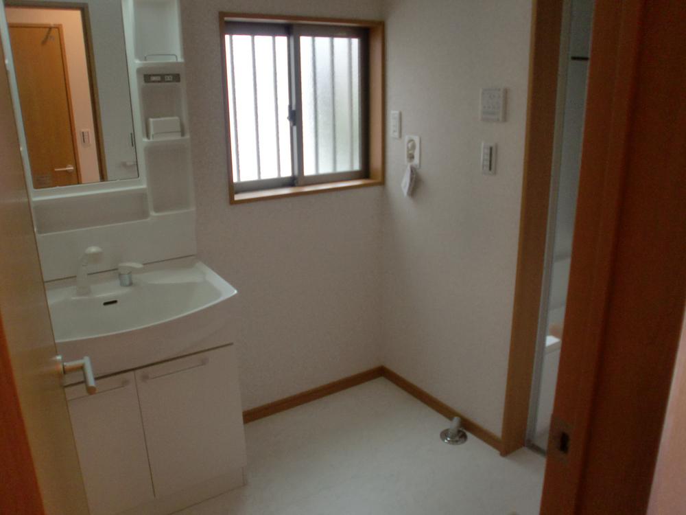 Wash basin, toilet. Spacious wash room of the space