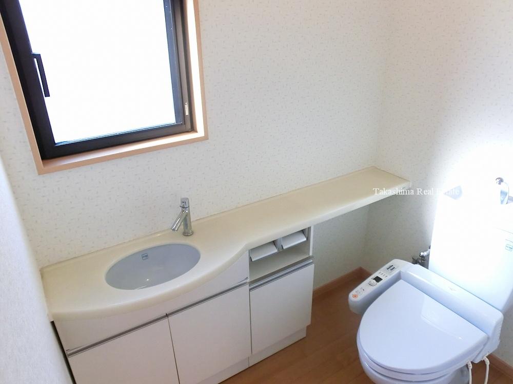 Toilet. Hand-wash with high-function toilet.