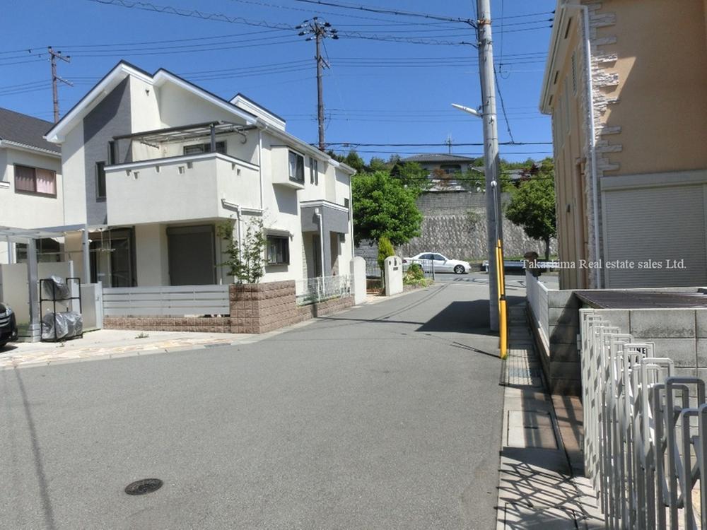 Local photos, including front road. Front road is spacious 6m width.