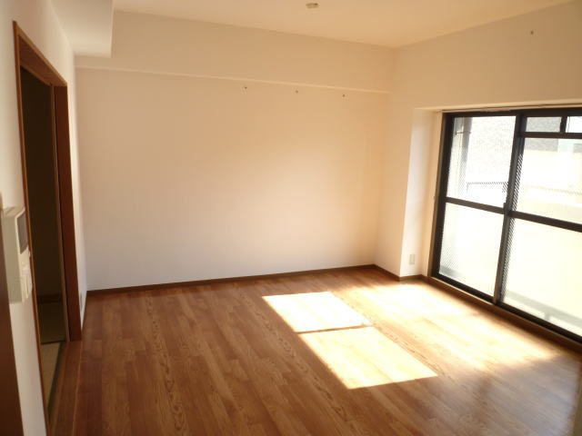 Living and room. Bright living room facing the balcony