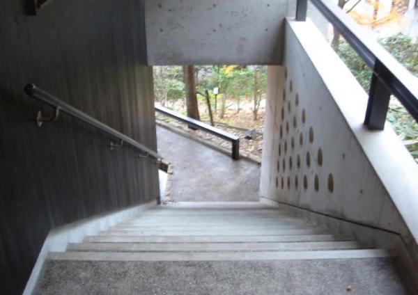 Entrance. ■ Entrance approach ■ Stairs of concrete building. Carousel exudes an elegant atmosphere.