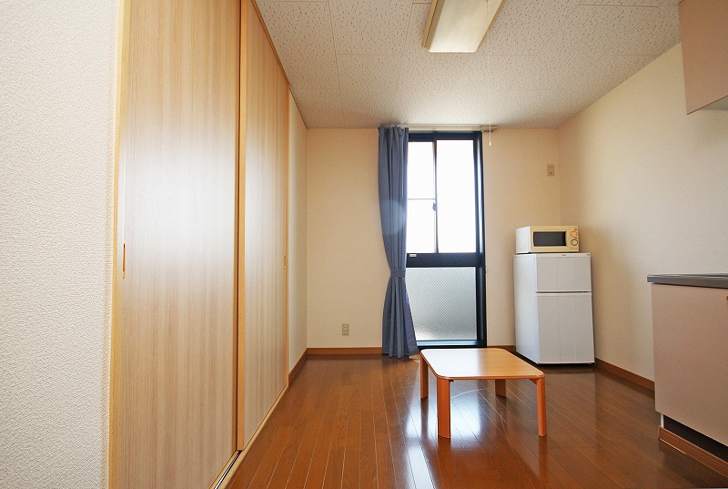 Living and room. Same type of image is a photo.