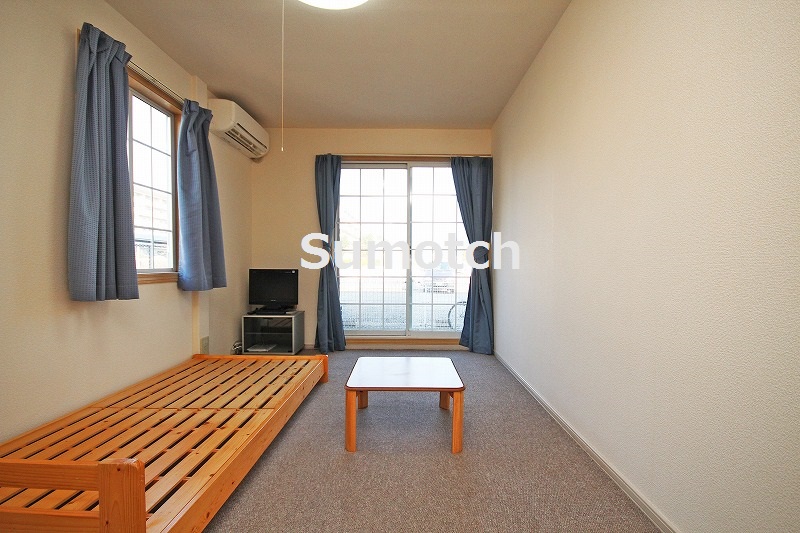 Living and room. Same type of image is a photo.