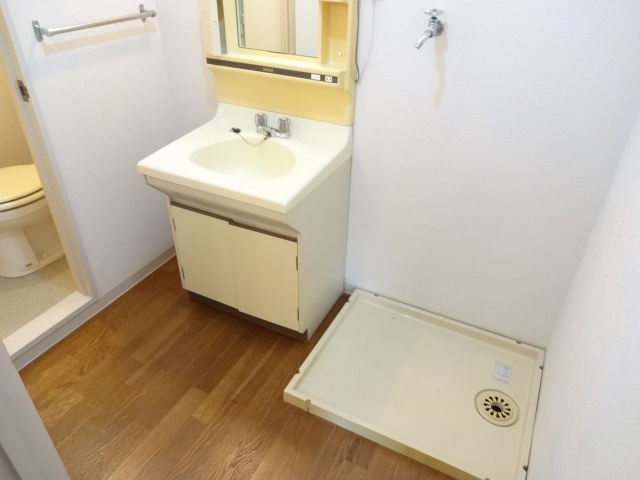 Washroom. With separate wash basin
