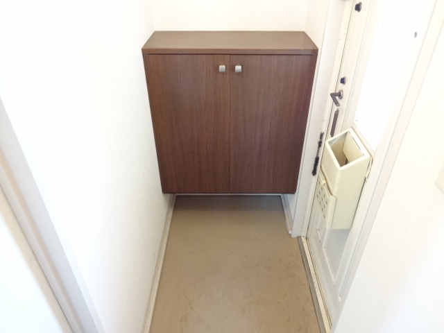 Entrance. With a shoe box