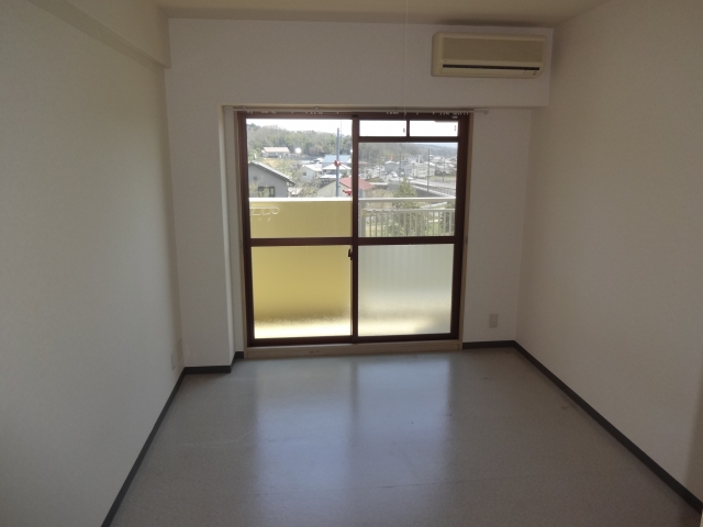 Living and room. Window over there does not have a building