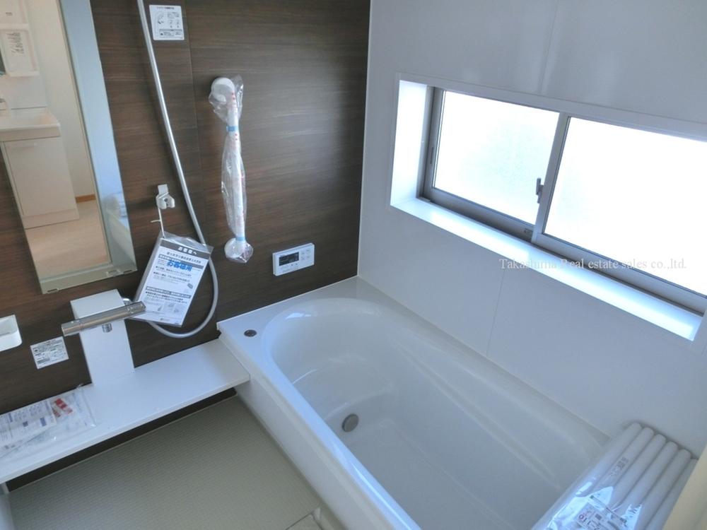 Bathroom. In the bathroom there is a large window.