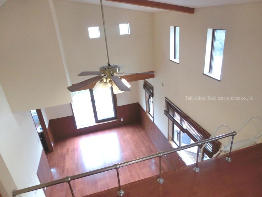 Living. There is a loft in the living room.