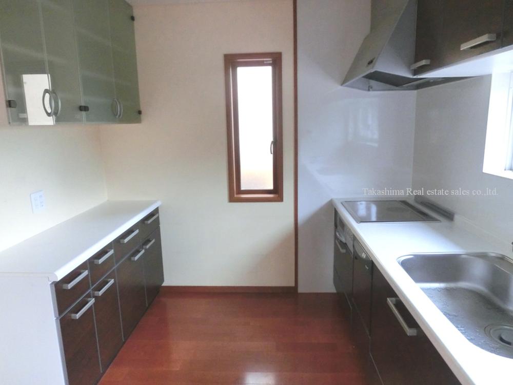 Kitchen. It is with cupboard on the back.