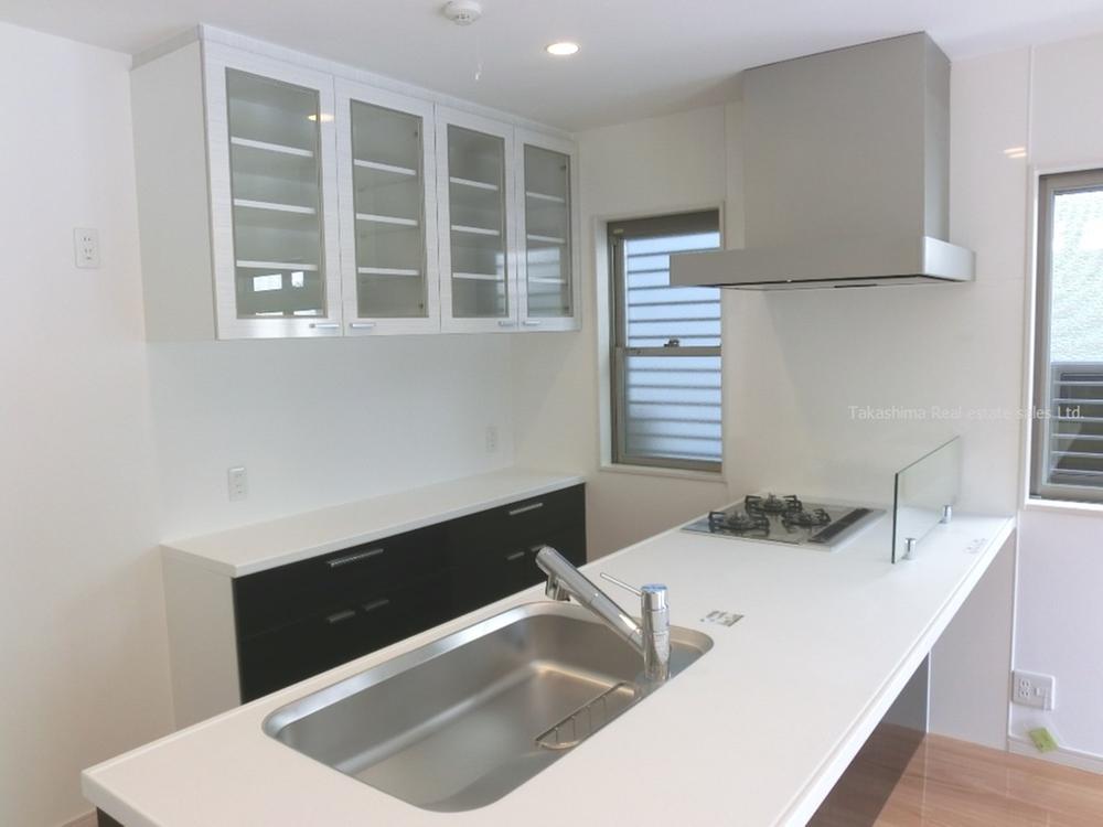 Kitchen. Cupboard is standard equipment.