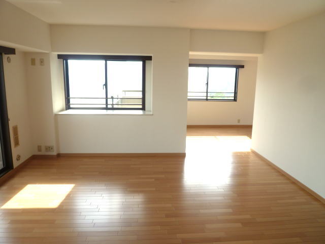 Living and room. Bright living room facing the balcony It has been changed to flooring