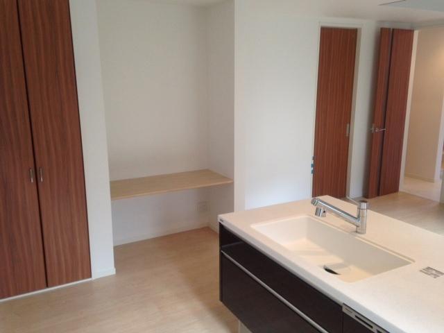 Other. It adopted a storage and work space of happy kitchen next to wife.