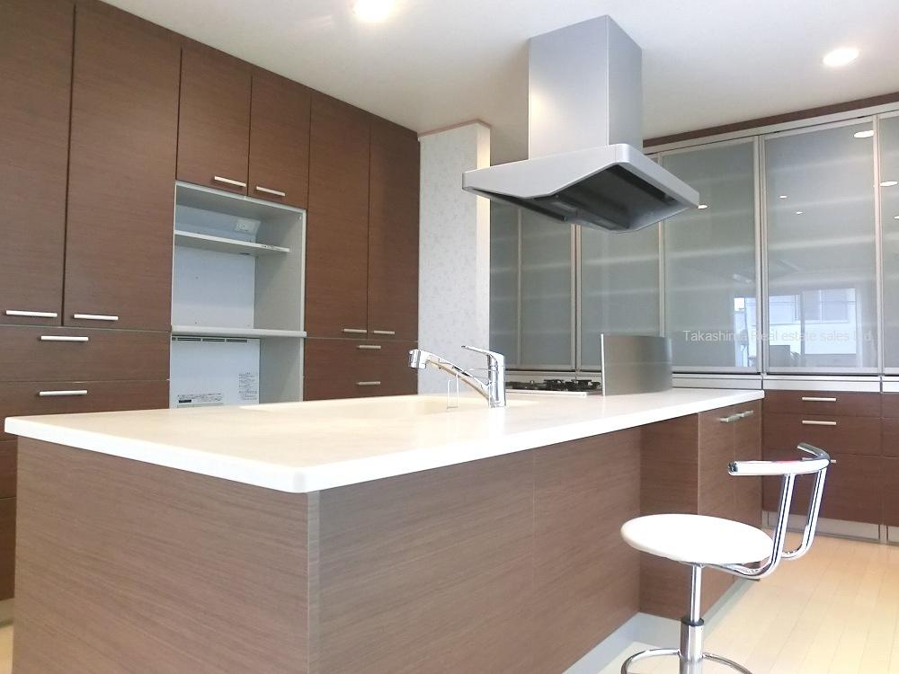 Kitchen. Color scheme cupboard that is equipment 2 sides to match the kitchen. Storage is useful.