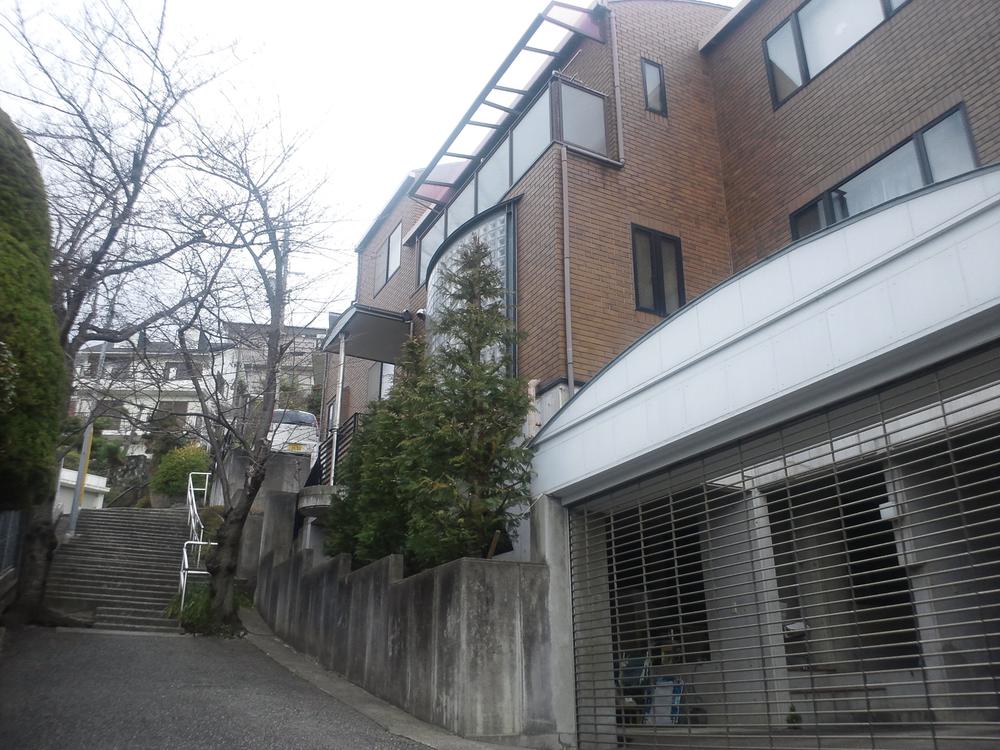 Local appearance photo. Is a corner lot, but traffic is also a small cityscape