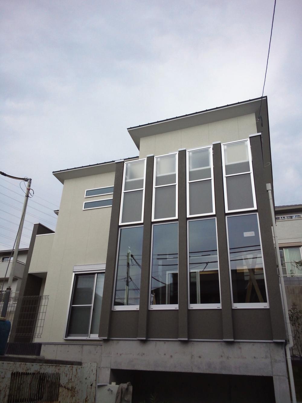 Local appearance photo. Stylish appearance form to be built on a hill of 23-7 No. land model house Yamatedai.