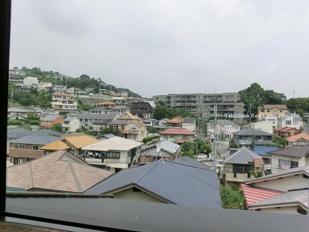 View photos from the dwelling unit. It is the north side of the view.