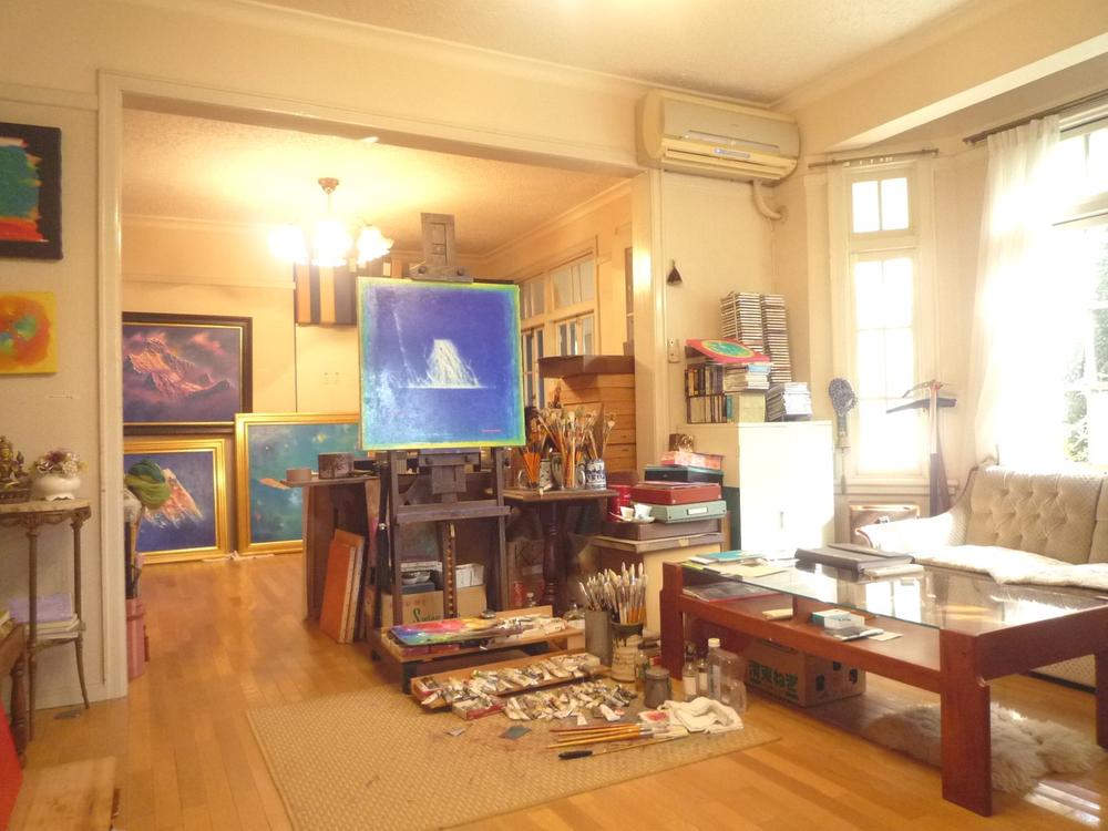 Living. Currently it is being used as a living room-cum-studio.