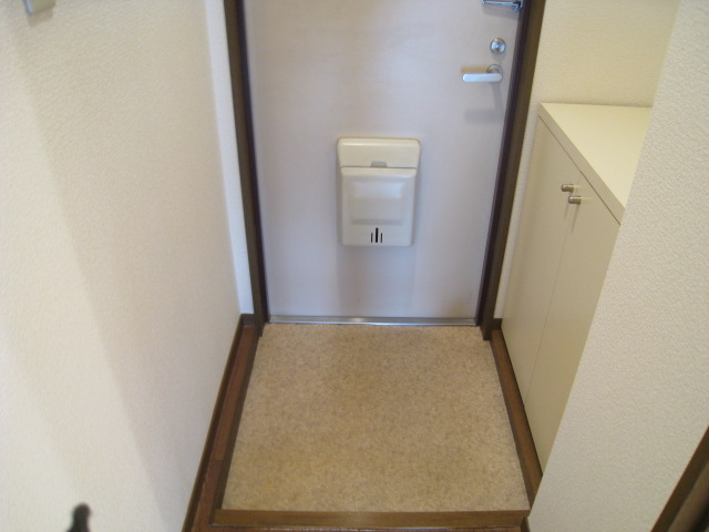 Entrance. There is a long hallway from the front door.