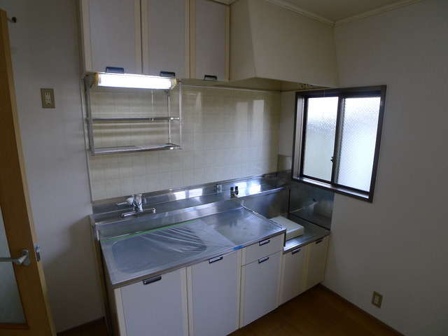 Kitchen. Bright kitchen with a small window.