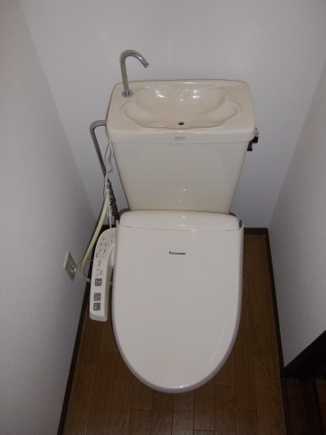 Toilet. Warm water washing toilet seat