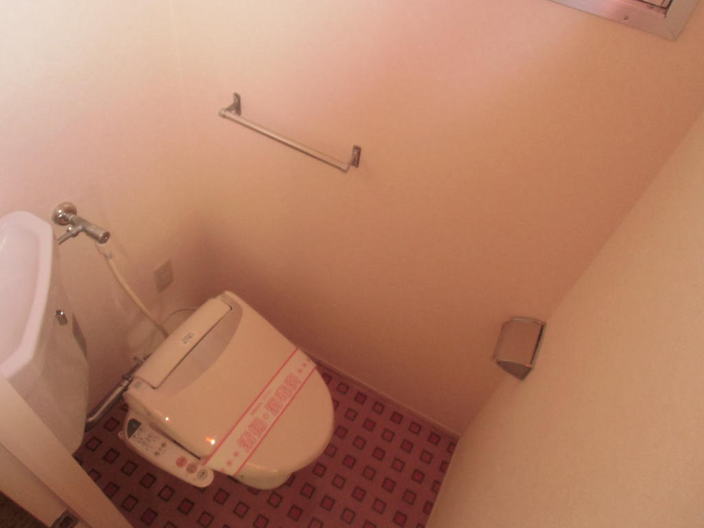 Toilet. Washlet is with