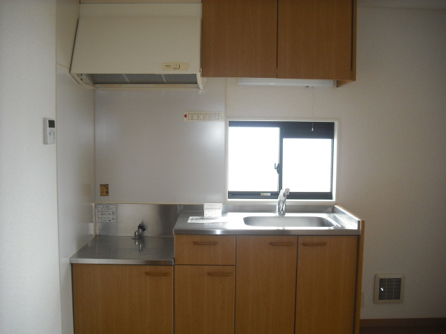 Kitchen. It is bright and there is a window