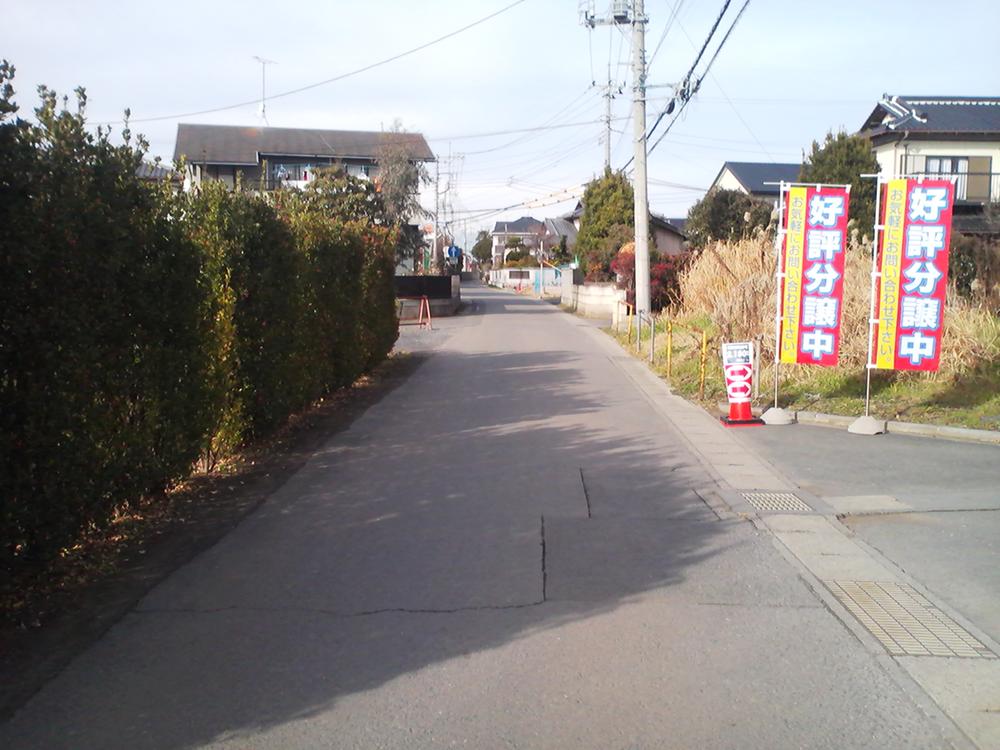 Local photos, including front road. Near the property entrance