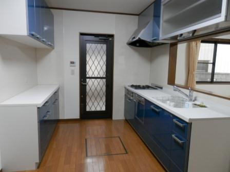Kitchen. With dishwasher and cupboards. 