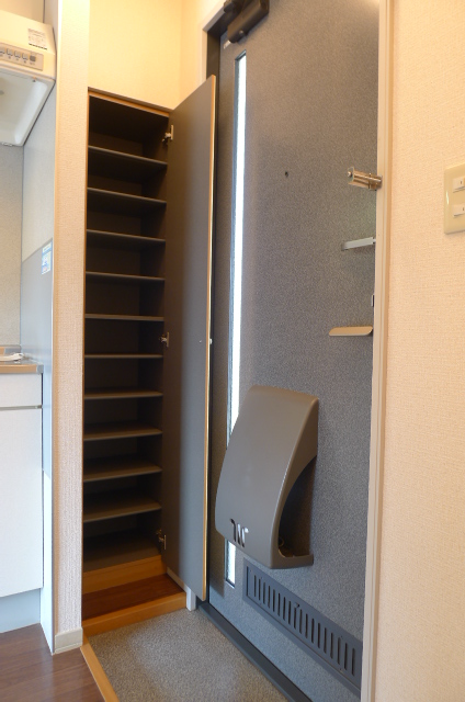 Entrance. With a large shoe box