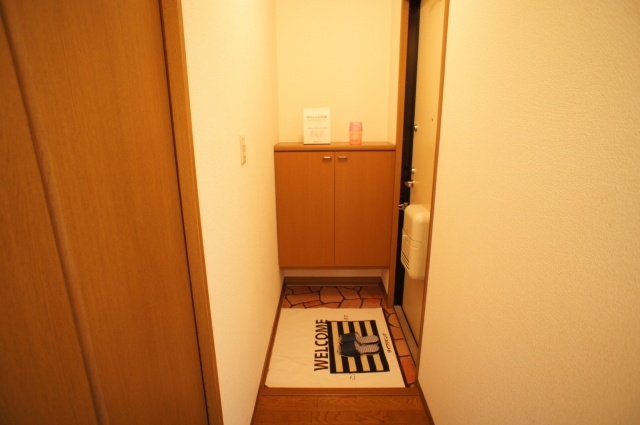 Entrance. With a shoe box