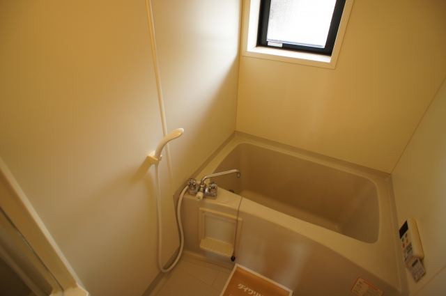 Bath. Bathing with a small window with & reheating hot water supply