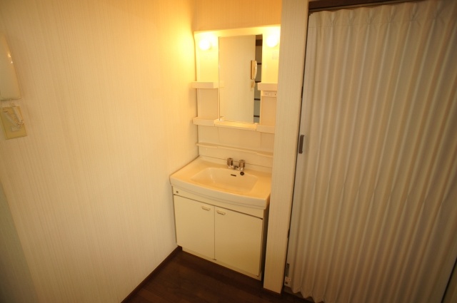 Washroom. With separate wash basin