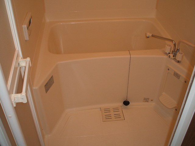 Washroom. Bathing with reheating hot water supply