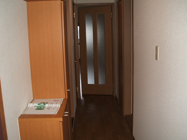 Entrance. With a shoe box