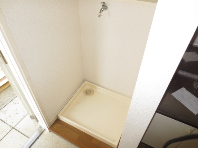 Other Equipment. Washing machine in the room