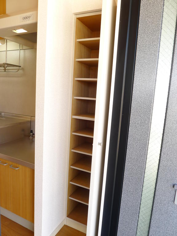 Entrance. Enhancement also shoe box