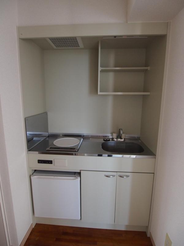 Kitchen. A kitchen with a mini fridge