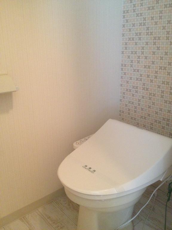 Toilet. Stylish wallpaper